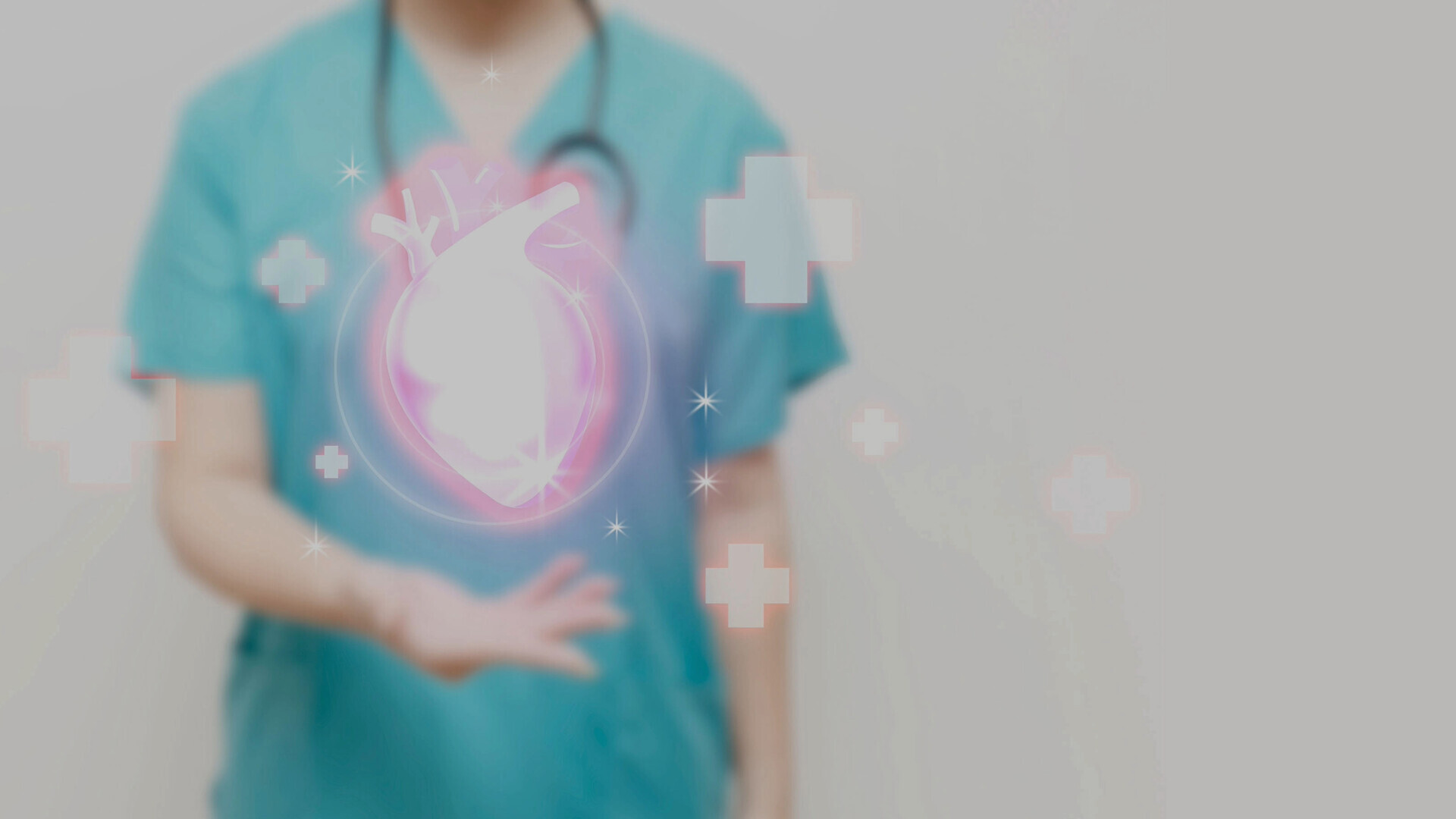 Medizinisches Personal mit Stethoskop und Herz im Vordergrund