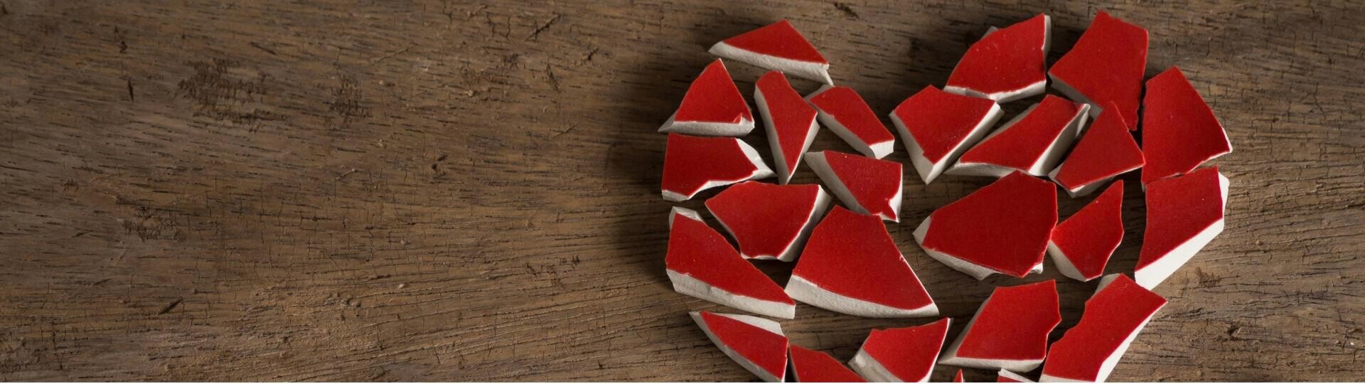 heart-broken-on-black-wood-red-1569105334-1920x540px